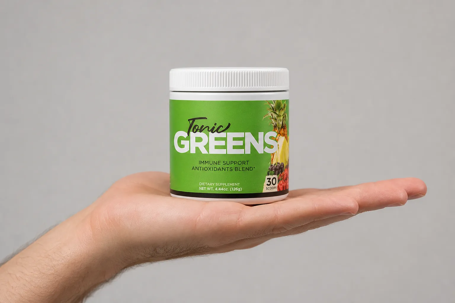 TonicGreens — the package held in a hand