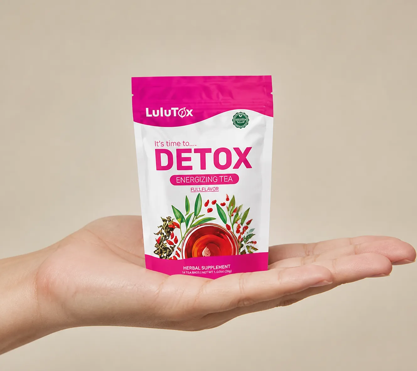 Lulutox Detox Tea — the package held in a hand