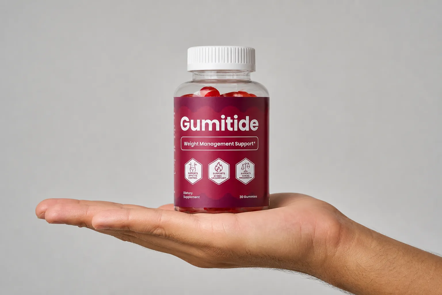 Gumitide — the package held in a hand